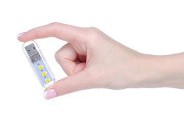 Mini portable usb led light in hand on white background isolation