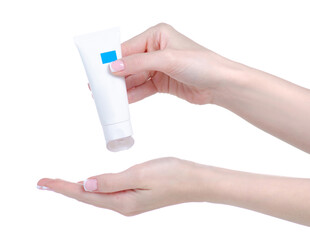 White tube of cream beauty in hand on white background isolation