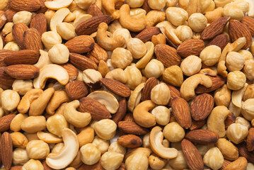 Mix of nuts isolated on white background. Top view.