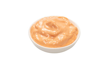 Sauce in a bowl isolated on white.