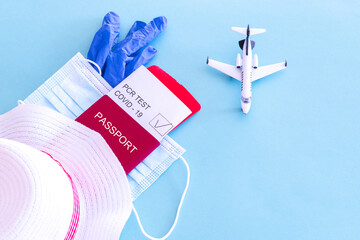 layout passport with ticket and pcr test medical mask on isolated background pandemic travel theme