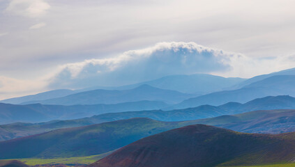 Obraz premium Mountains in fog going in layers into perspective