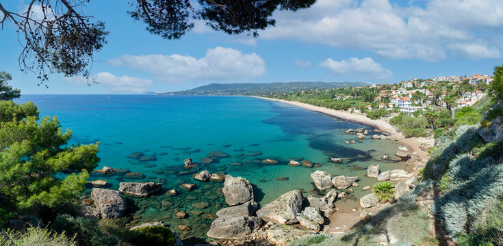 Beach of Zagka, panoramic view of the sandy beach of the city of Koroni, in the Messinia region, Peloponnese, Greece, Europe. 