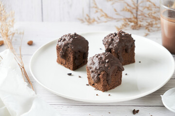 Chocolate Cube pound cake set on cafe table.