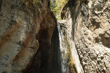 Scenic view of Tululusia Waterfall in Arusha National Park, Tanzania