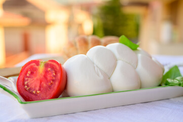 Fresh soft white italian cheese braid mozzarella buffalo made from Italian buffalo's milk by pasta filata method