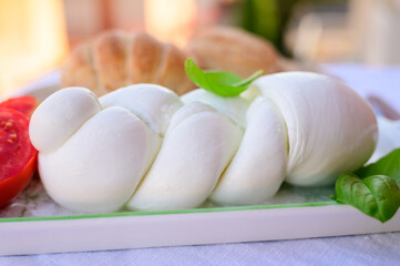 Fresh soft white italian cheese braid mozzarella buffalo made from Italian buffalo's milk by pasta filata method