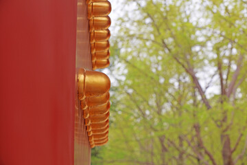 Red wooden palace gate in Ditan Park, Beijing, China