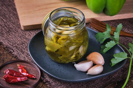 Vegan baked eggplants in crystal jar.
