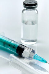  Vaccine in vial with syringe