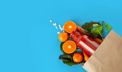 paper bag of vegetables and fruits, or healthy food delivery background. Healthy vegetarian food, copy space. Food supermarket and pure vegan food concept.
