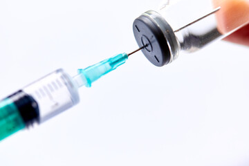  Vaccine in vial with syringe