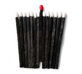 black matches with white heads and one with red head isolated over white