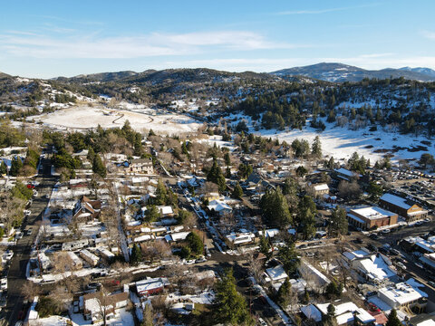 Aerial view of historic Downtown City of Julian during snow day. Famous for it's apple pies, and the Wilcox Building.California, USA - Powered by Adobe