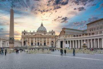 Tourists in Saint Peter's Basilica and square at sunset, Vatican City, Rome, Italy