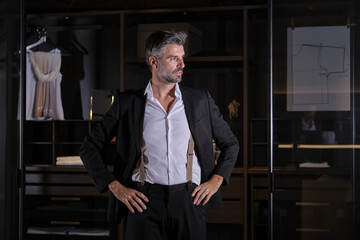 Stock photo of elegant business man posing in his dressing room.