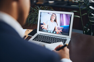 Male student listening to his smiling pleased experienced online tutor
