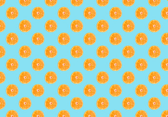 Fresh oranges  pattern on blue background. Minimal concept. Summer minimal concept. Flat lay.