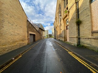 View along, Upper Park Gate, as it leads to, Barkerend Road, with high rise apartments in the...