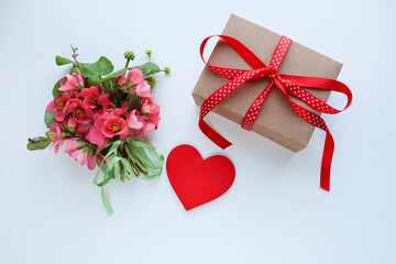 Happy Valentine's Day greeting card. spring flowers, red heart and gift box 