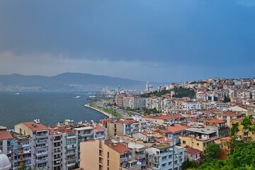 Fototapeta na wymiar Izmir, City Lanscape through historical elevator, Sea and city lanscape with buildings, mountains, sea and old buildings, view on top