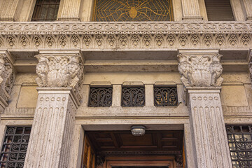 Architectural fragments of Rome Traditional Old house with sculptures in the City Old town. Rome,...