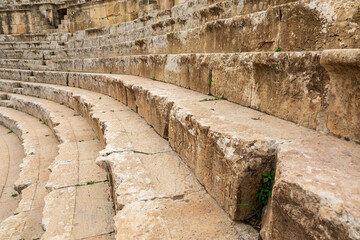 Fototapeta na wymiar Ruins of ancient Roman amphitheatre in city of Gerasa in Jerash, Jordan