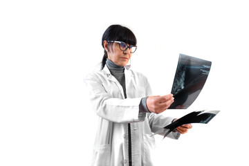 Female doctor reviewing breast x-rays