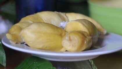 Durian fruit flesh on a white plate