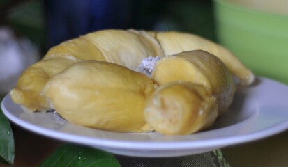Durian fruit flesh on a white plate