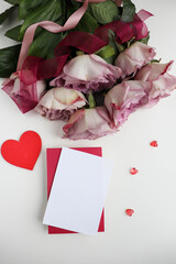 Happy Valentine's Day greeting card. large bouquet of roses, red heart, gift box and envelope for text 