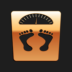 Gold Bathroom scales with footprints icon isolated on black background. Weight measure Equipment. Weight Scale fitness sport concept. Long shadow style. Vector.