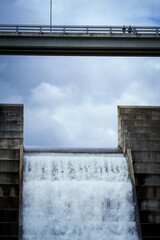 The Hinze Dam is a rock and earth-fill embankment dam with an un-gated spillway across the Nerang...
