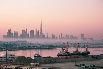 Fototapeta premium Dubai city skyline at morning fog