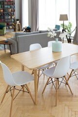 The interior design of the studio apartment in Scandinavian style. A spacious huge room in light colors. stylish expensive luxury furniture.