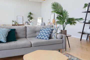 The interior design of the studio apartment in Scandinavian style. A spacious huge room in light colors. stylish expensive luxury furniture.
