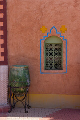 window in the wall of a moroccan house in saara desert