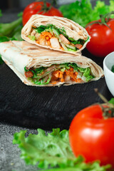 Homemade diet fresh shawarma with greens, chicken breast and tomatoes