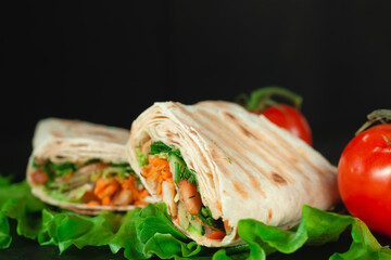 Homemade diet fresh shawarma with greens, chicken breast and tomatoes