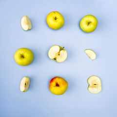 Creative layout made of green apple on the blue background. Flat lay. Food concept. images. Copy space. Space for text.