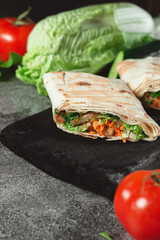 Homemade diet fresh shawarma with greens, chicken breast and tomatoes