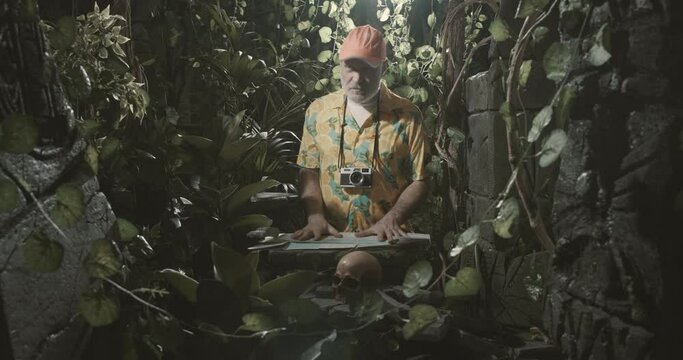 Scared tourist lost in the jungle with a map