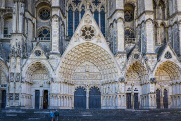 Fototapeta na wymiar the beautiful carved facade of the Cathedral of Bourges (Berry, France), a gothic wonder listed as a UNESCO World Heritage site