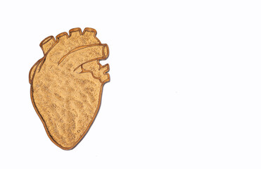 Maca root powder in heart shaped bowl