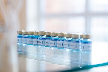 Some ampoules with vaccine. Glass vials medical close-up.