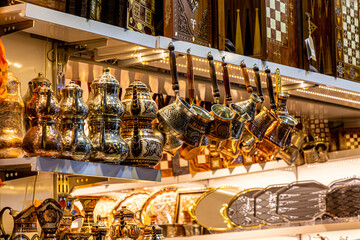 Arab souvenir shop with copper utensils: teapots, coffee pots and other utensils