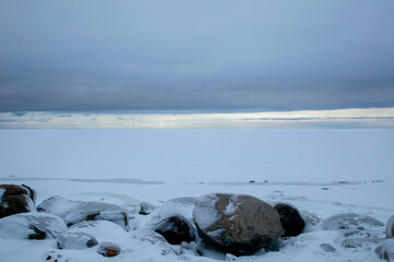 Seascape on a winter snowy day. Ladoga lake.
