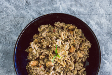 plant-based food, vegan buckwheat pasta with dairy-free creamy mushroom sauce and butter beans