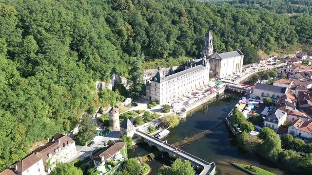 Flight over the city Brantome en Perigord on summer day. France