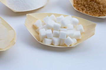 Fototapeta na wymiar Various types of sugar on white
